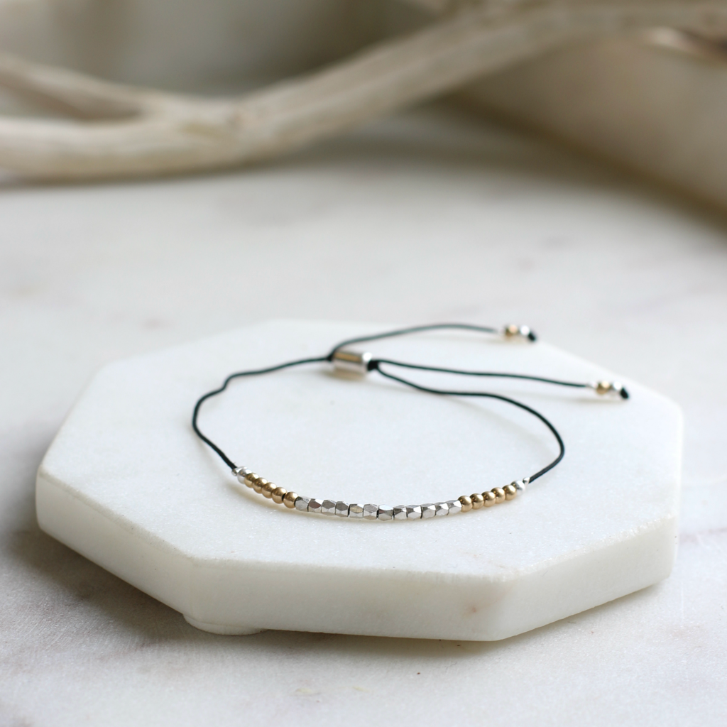 Dainty gold and silver bracelet